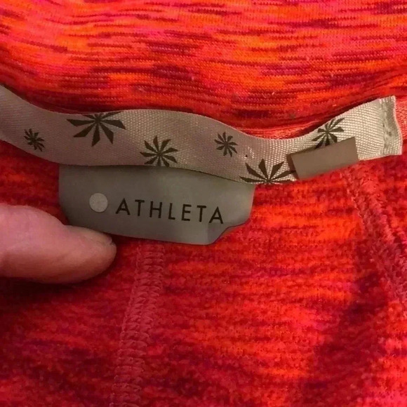 Athleta hoodie with two open pockets on front and zippered pocket on sleeve. - Picture 9 of 13